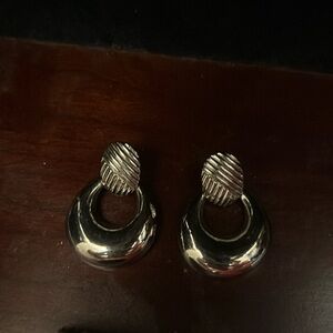 Silver colored drop hoop earrings